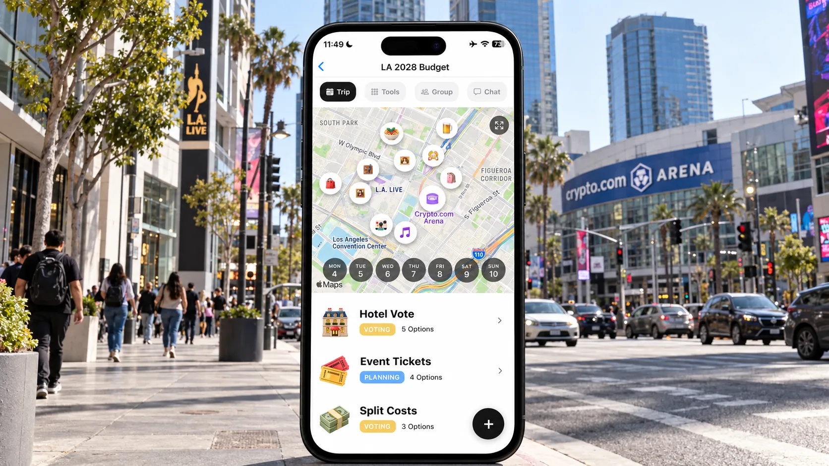 AI illustration of a FlowTrip Olympics budget planning screen on a phone against a Downtown Los Angeles street